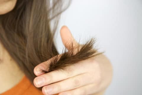 What is the best way to deal with damaged hair and split ends?